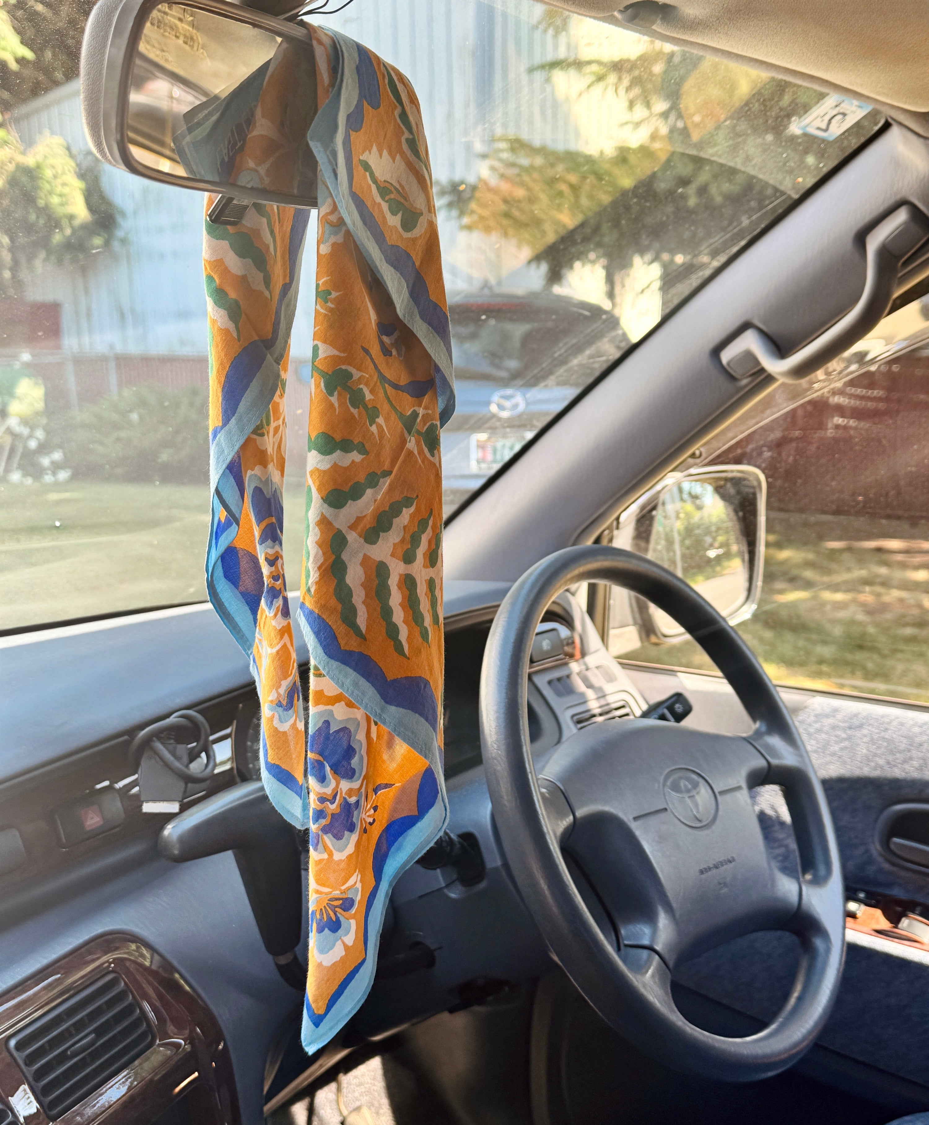 5 Unexpected Ways to Use a Scarf on a Summer Road Trip